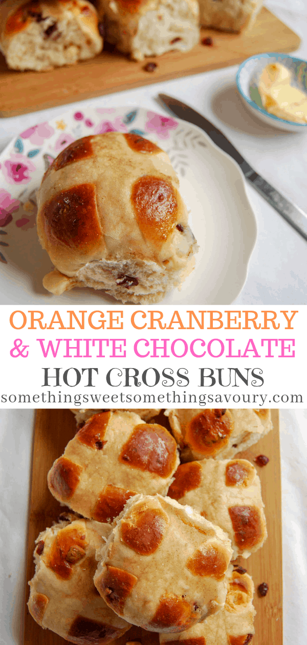 An Orange Cranberry and White Chocolate Hot Cross Bun on a pretty floral plate and a pile of hot cross buns on a wooden board.