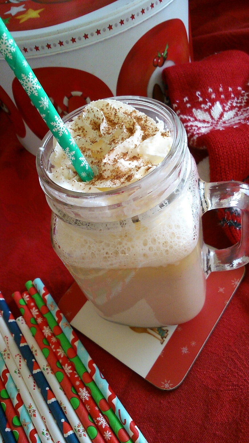 a kilner mug filled with Christmas spiced white hot chocolate.