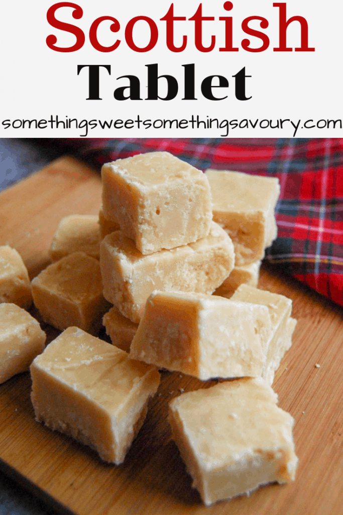 A pinterest pin with the words "Scottish tablet" at the top in black bold writing and a photo of squares of tablet on a wooden board.