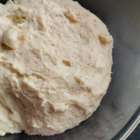 Sweet bun dough in a bowl