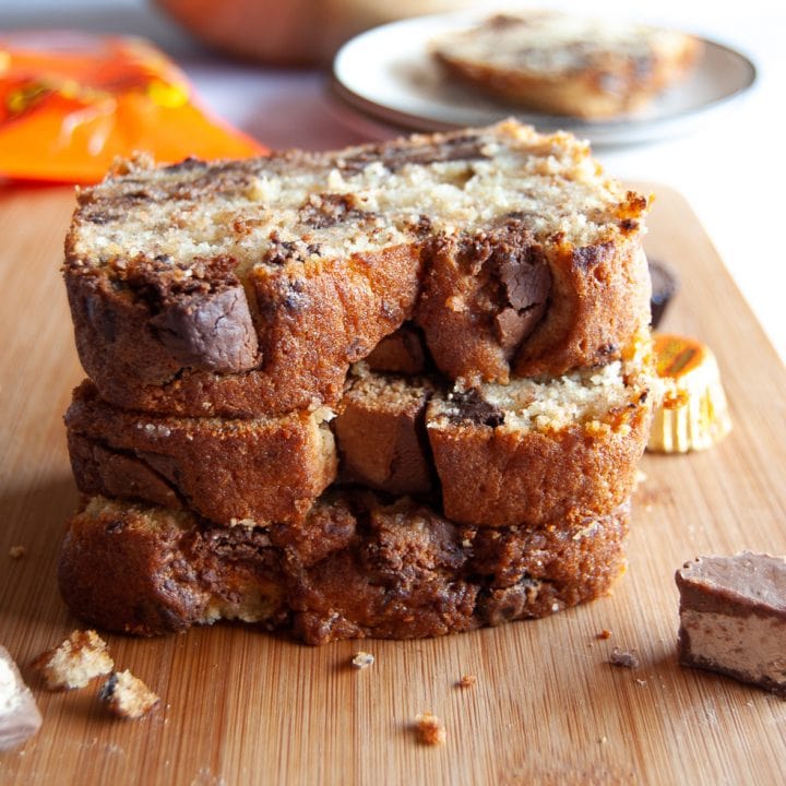 A close up photo of cut slices of peanut butter cup banana bread.