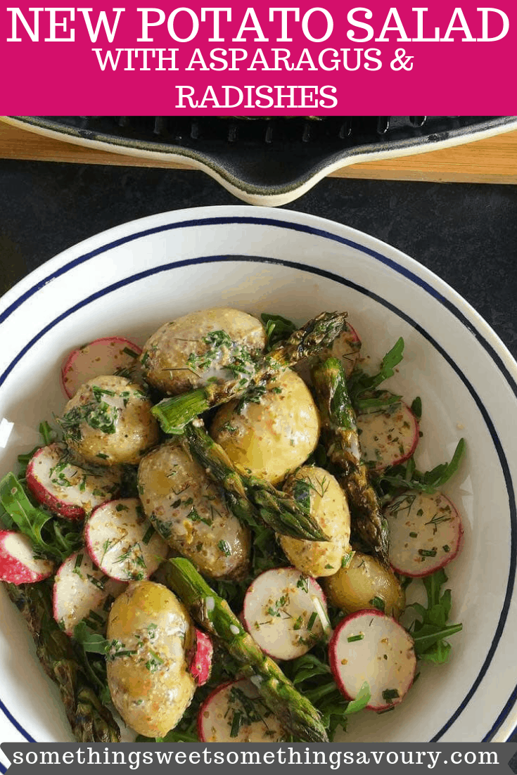 A pinterest pin with the words "new potato salad with asparagus and radishes" in white writing on a pink background. A salad with new potatoes, grilled asparagus and radishes with a herby buttermilk dressing in a white and blue bowl.