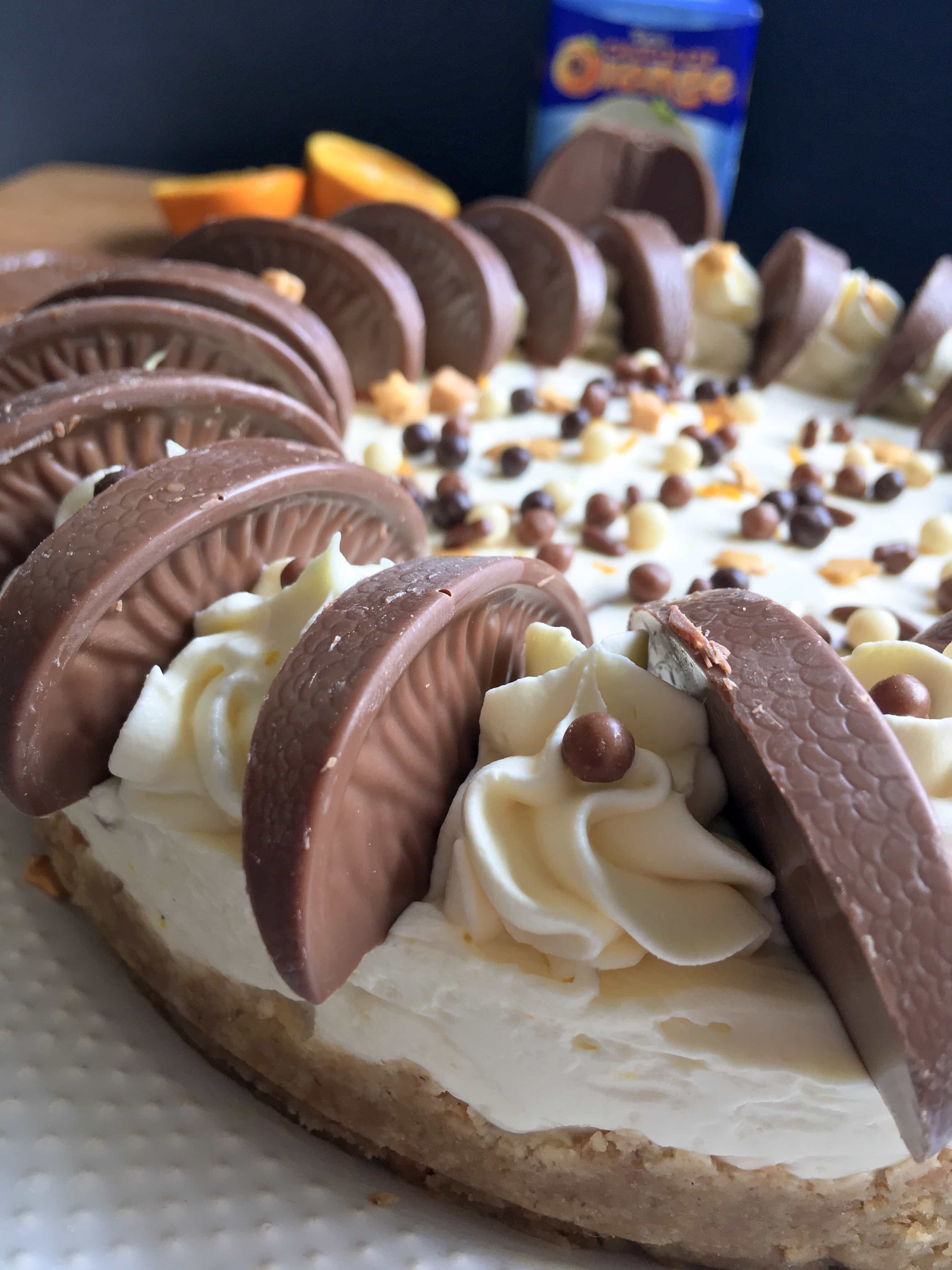 A close up photo of a no bake Terry's chocolate orange cheesecake