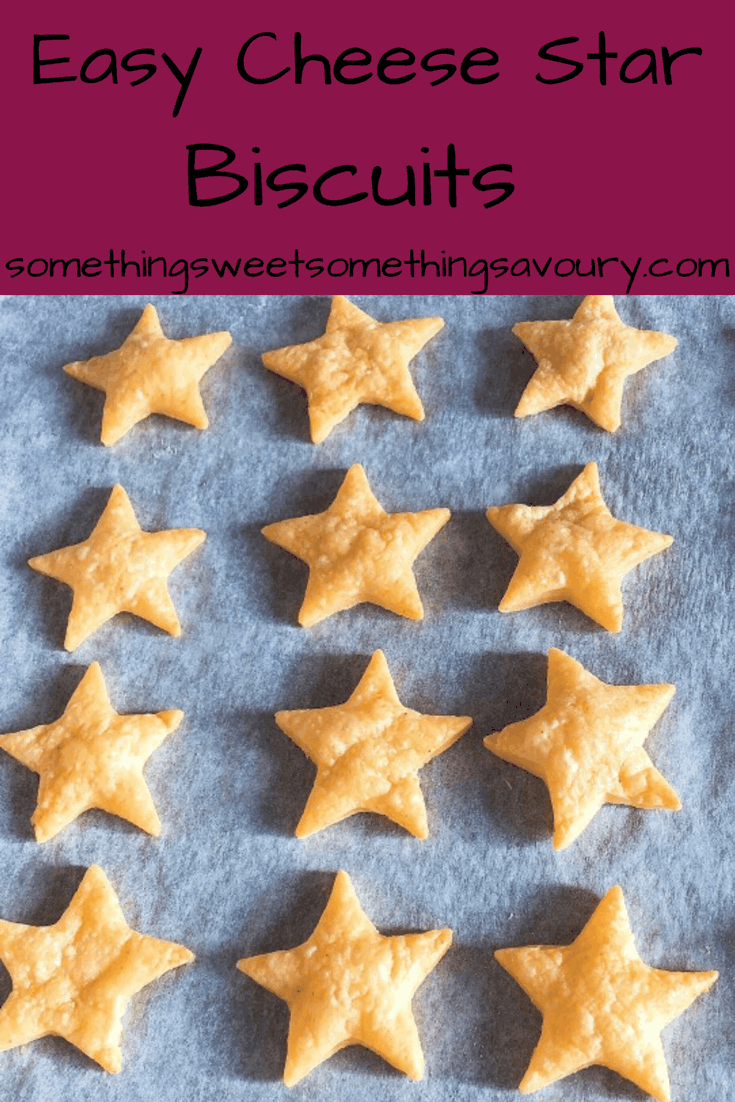 A pinterest pin with the words "easy cheese star biscuits" and a photo of star biscuits on a baking tray.