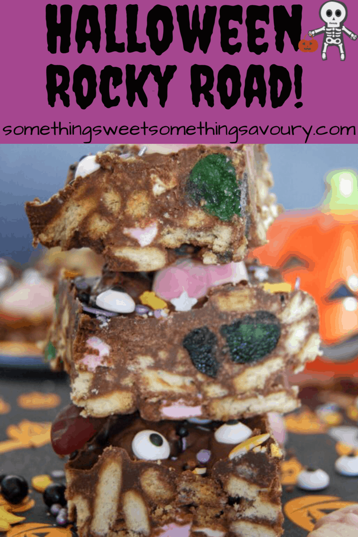 A Pinterest Pin with the words "Halloween Rocky Road" in black writing on a purple background with a picture of rocky road with green cherries, marshmallows and halloween candy