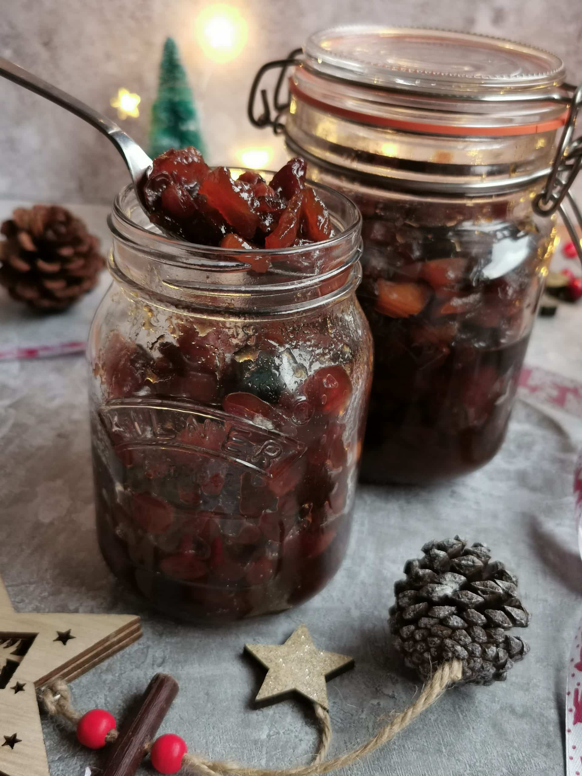 Two jars of mincemeat on a grey background 