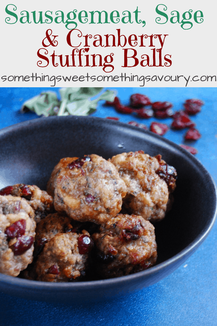 a pinterest pin with the words "sausagemeat, sage and cranberry stuffing balls" in green and red text with a picture of cranberry studded stuffing in a black bowl.