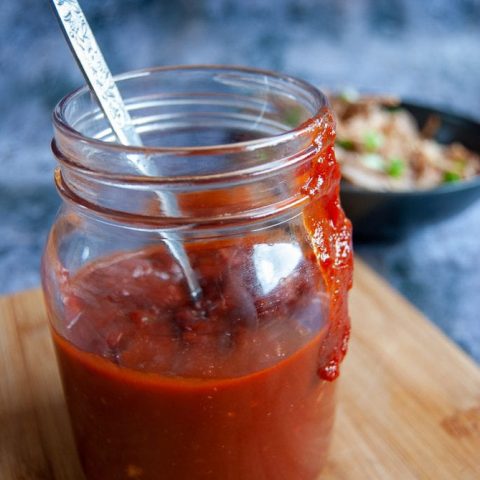 A close up photo of a jar of Easy BBQ Sauce.