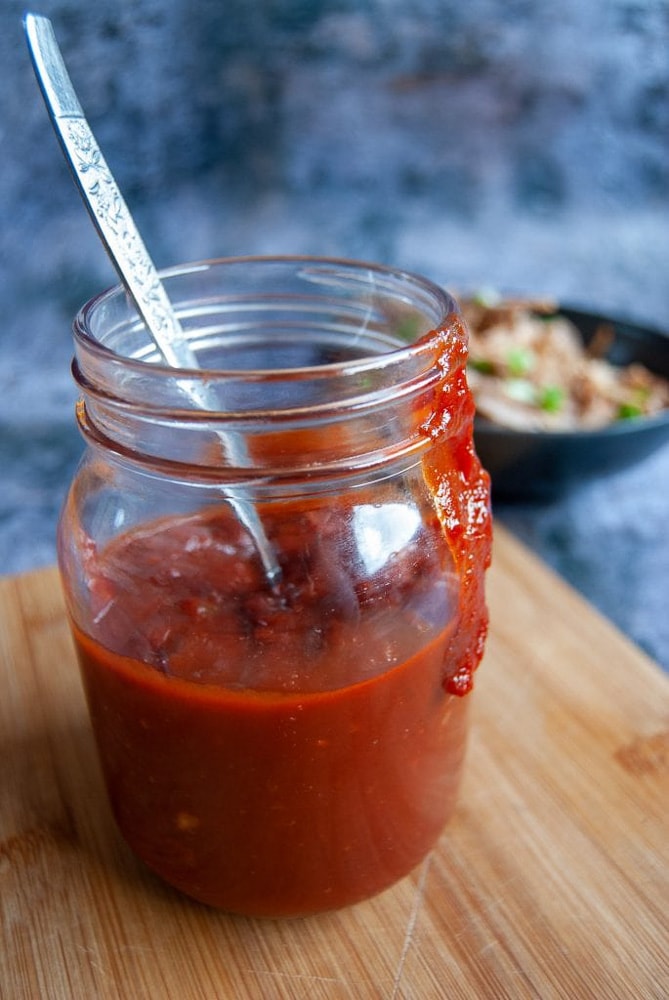 A close up photo of a jar of Easy BBQ Sauce.