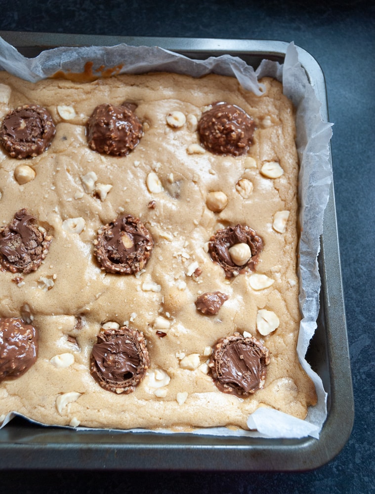 A tray of unbaked Ferrero Rocher blondies