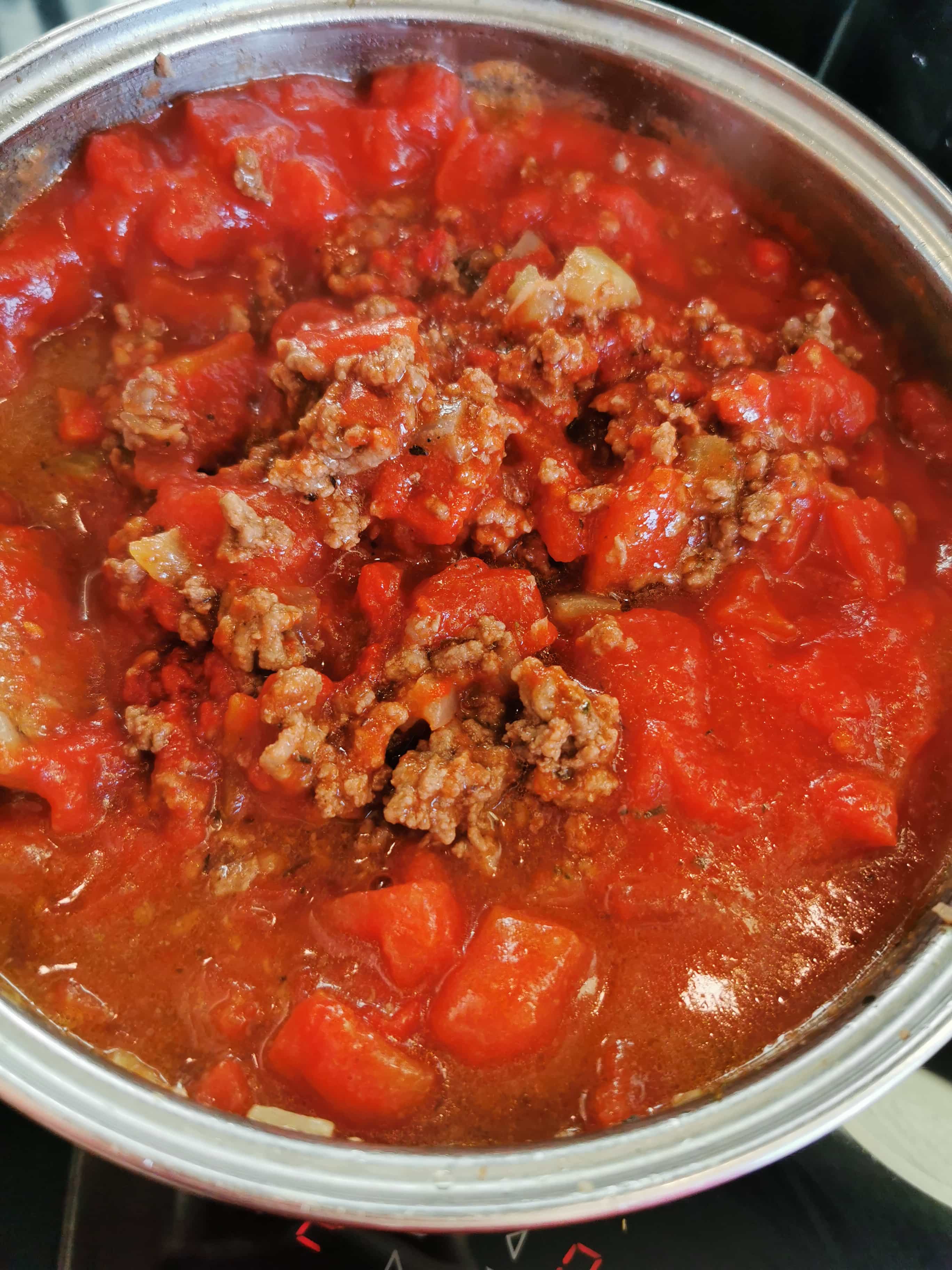 A pan of bolognese meat sauce.