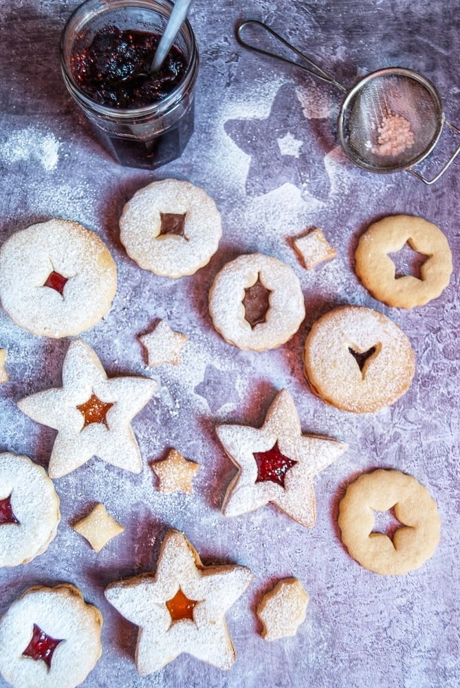 A display of linzer cookies dusted with icing sugar