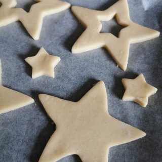 Unbaked star cookies on a baking tray