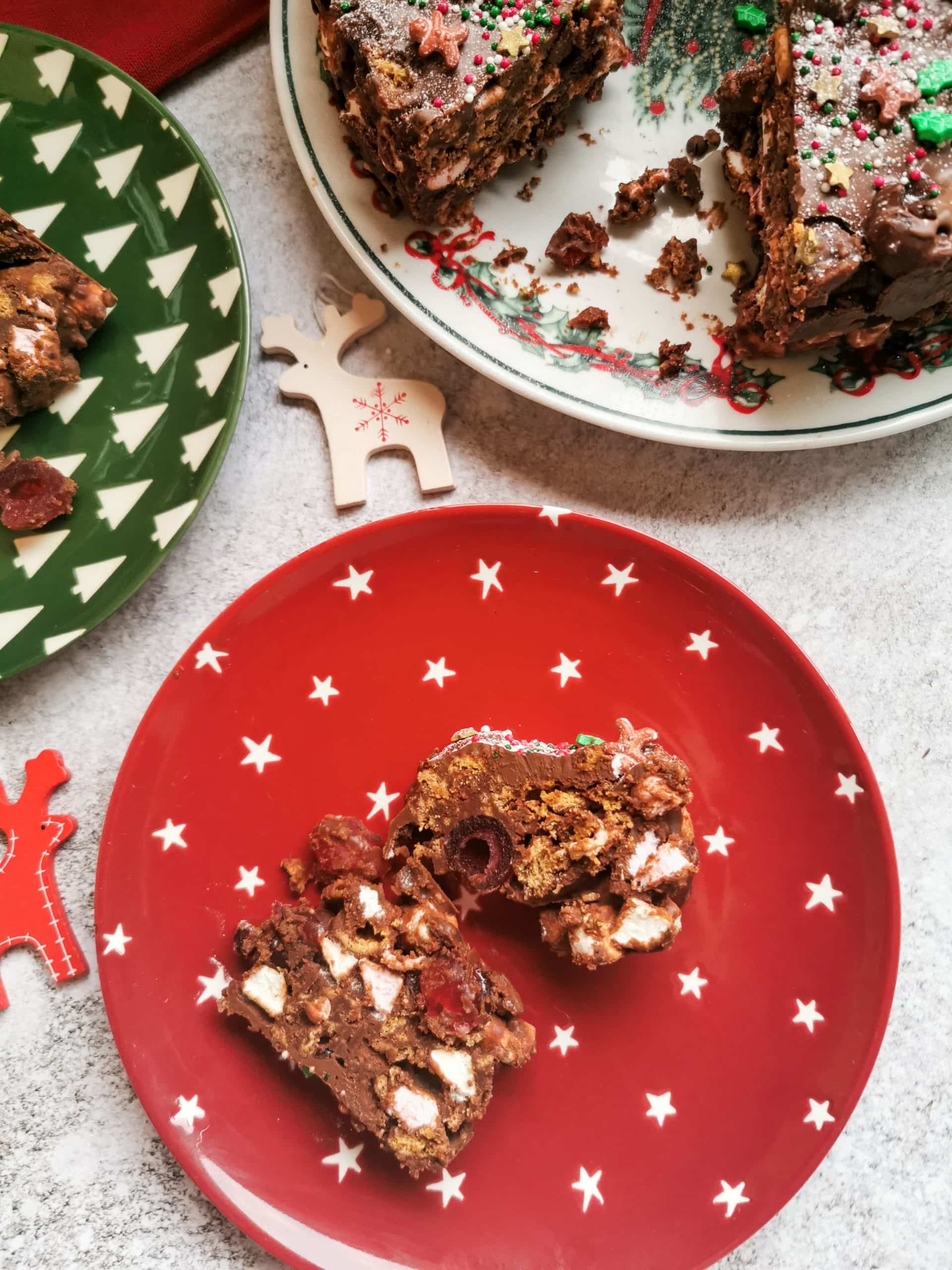 Pieces of Rocky Road with Christmas sprinkles on red and green Christmas plates