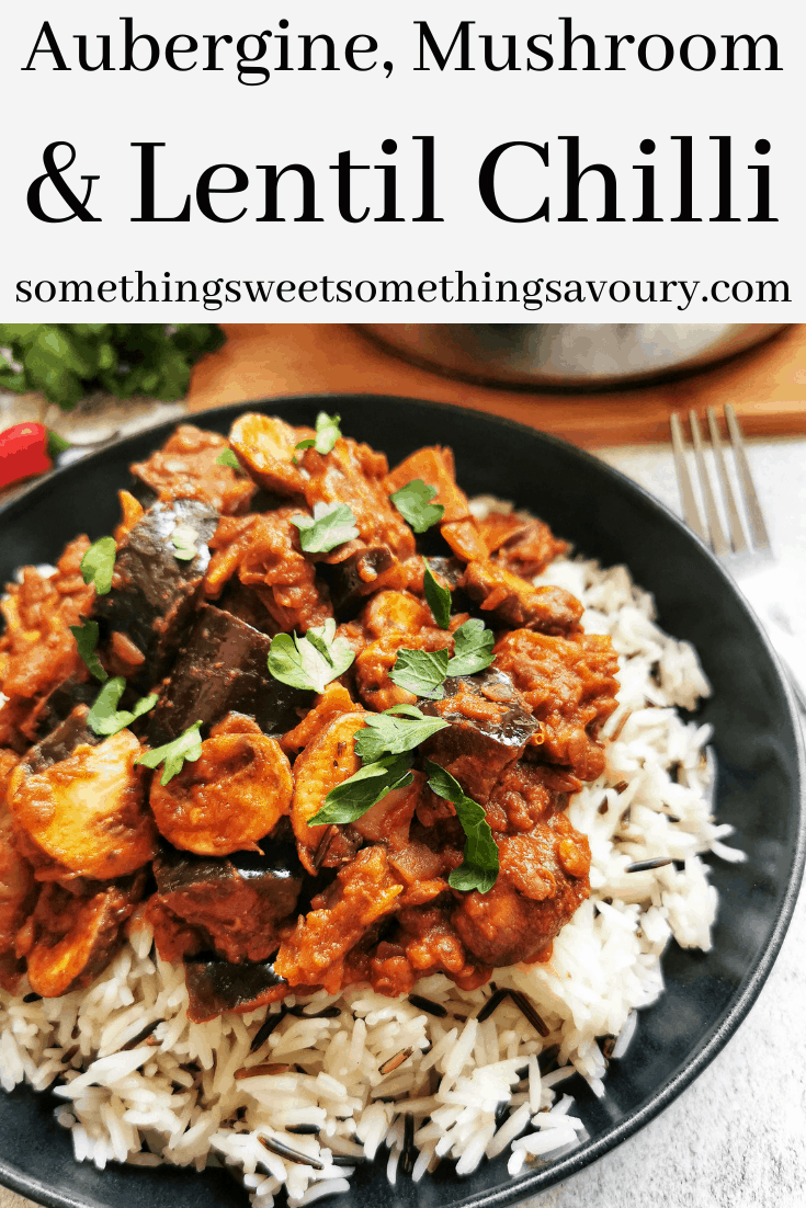 A pinterest pin with the words "aubergine mushroom and lentil chilli" with a photo of a bowl of chilli sprinkled with coriander