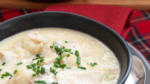 A bowl of Cullen Skink soup sprinkled with fresh chives