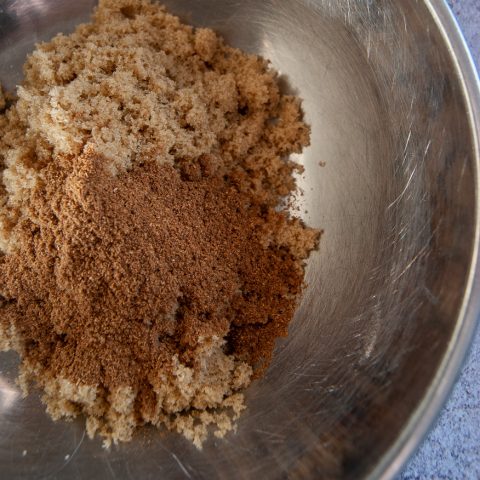 brown sugar and ground cinnamon in a silver bowl