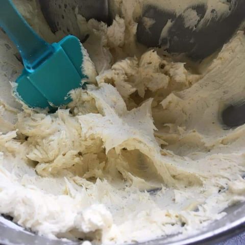 A bowl of butter and icing sugar beaten together 