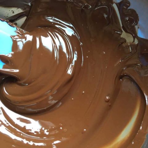 A bowl of melted chocolate 