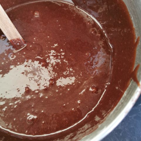 A saucepan of water and cocoa powder