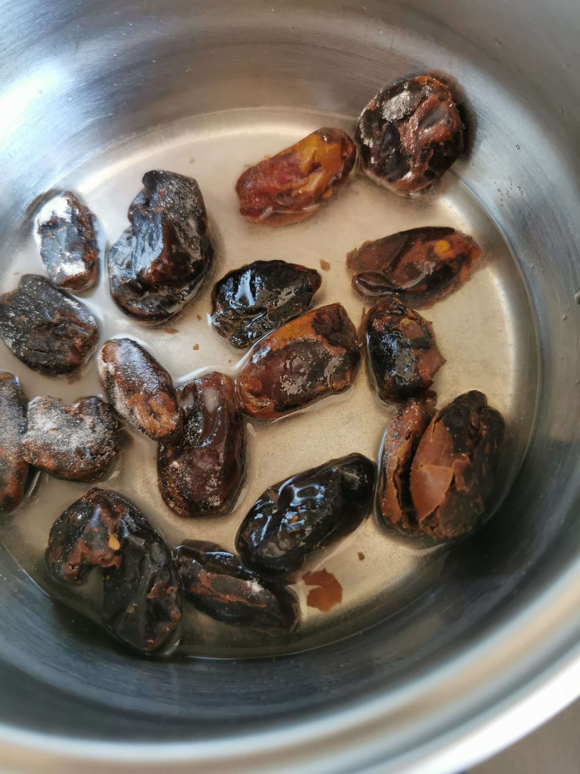 Chopped dates with water in a saucepan