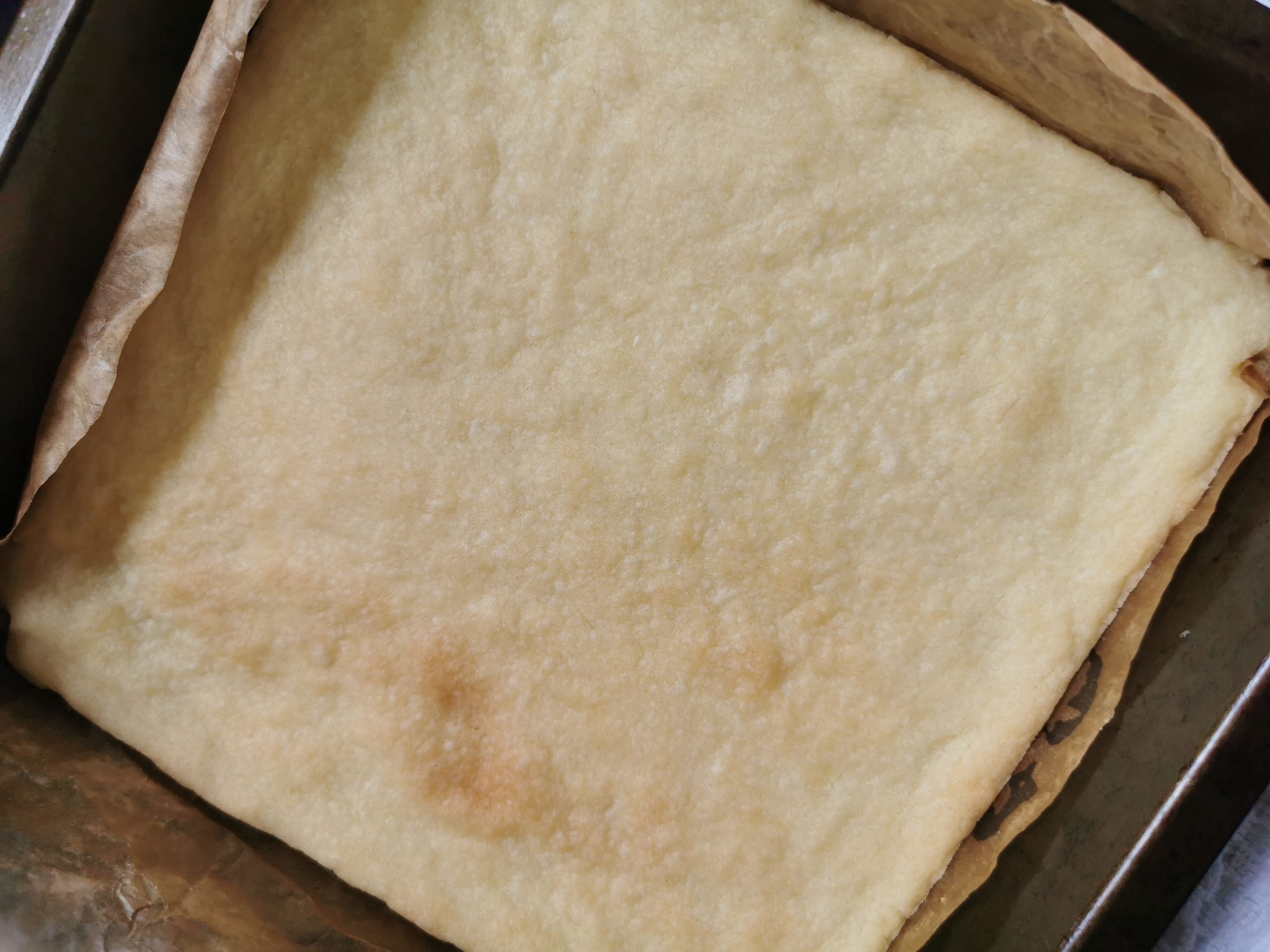 a square tin of freshly baked shortbread