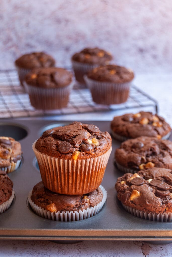 a silver pan of chocolate chip muffins