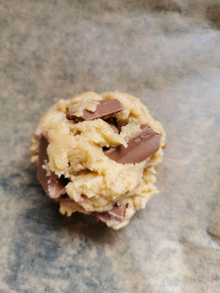 An unbaked cookie on a baking tray