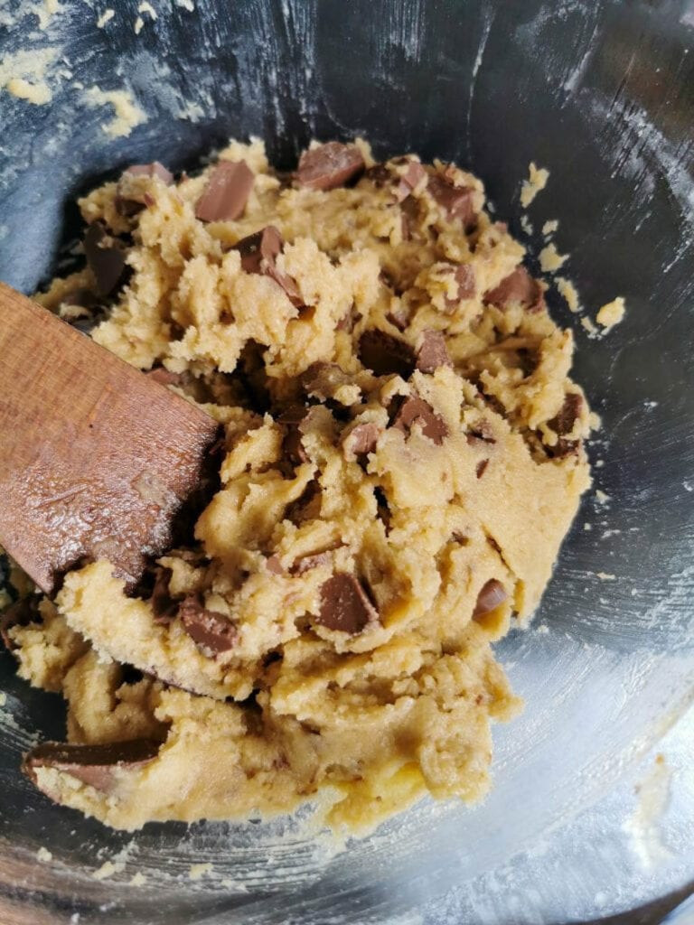 A glass bowl of chocolate cookie dough