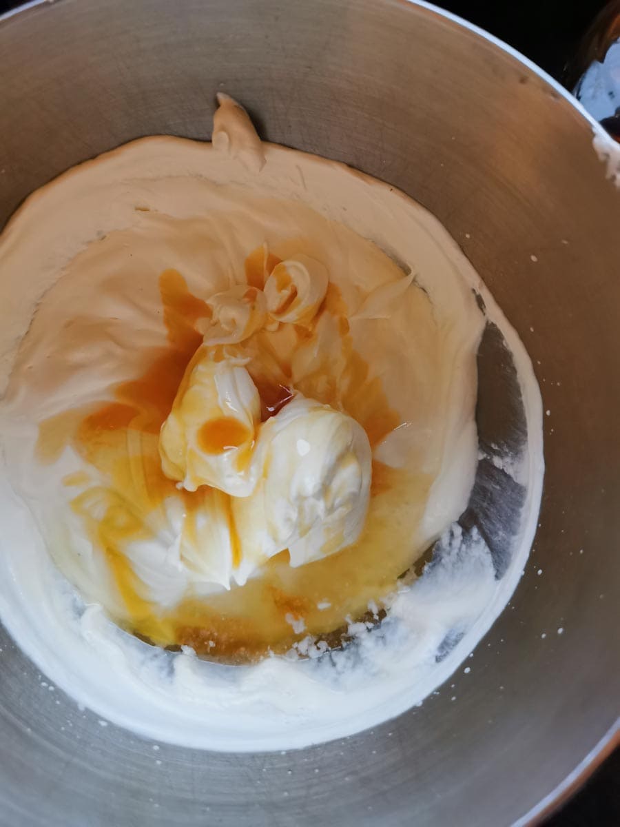 a large silver bowl of whipped cream, honey and Drambuie Whisky.