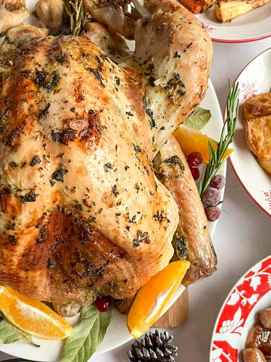 Easy Roast Turkey Recipe (with orange herb butter) - Something Sweet ...