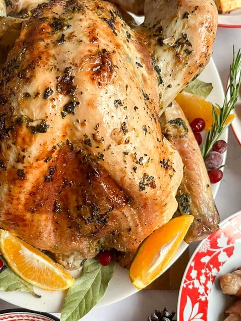 Easy Roast Turkey Recipe (with orange herb butter) - Something Sweet ...