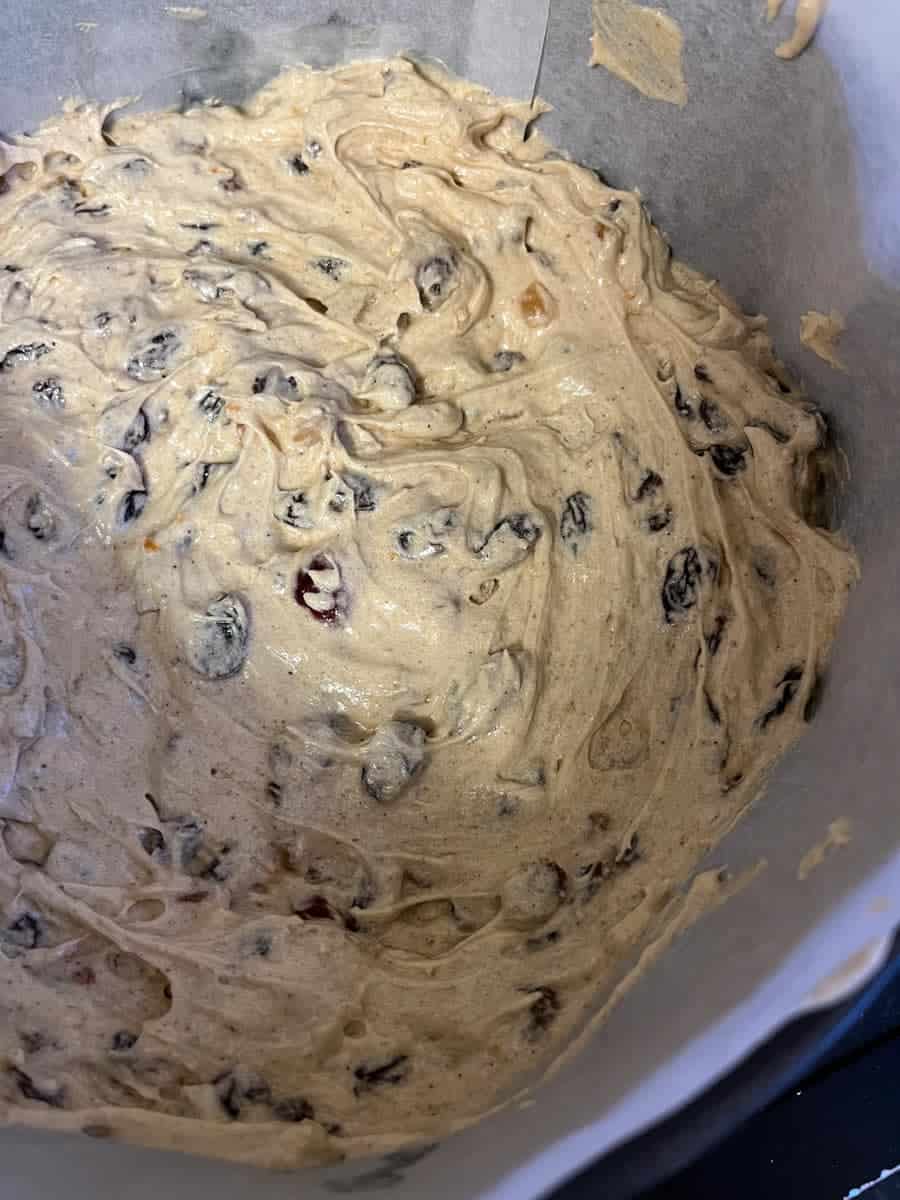 Fruit cake mix in a lined cake tin.