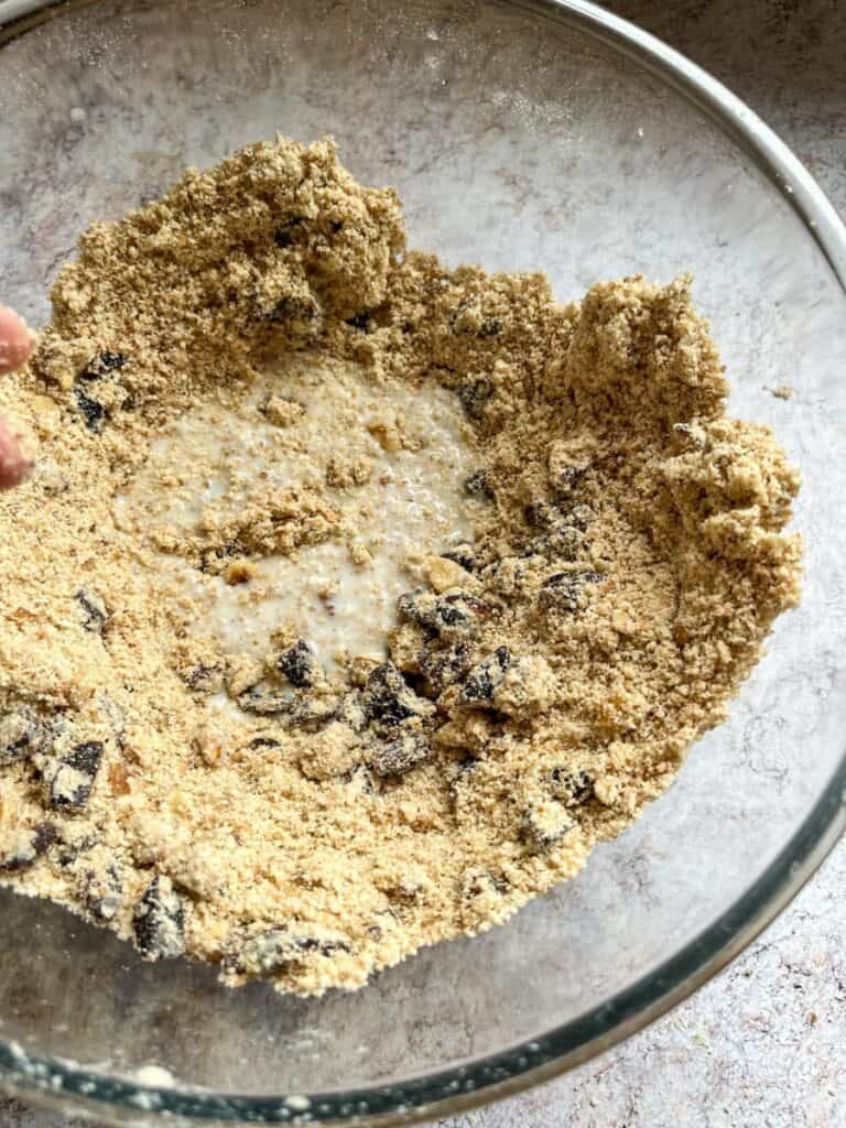 Flour, brown sugar, butter, chopped dates and milk in a large glass bowl.
