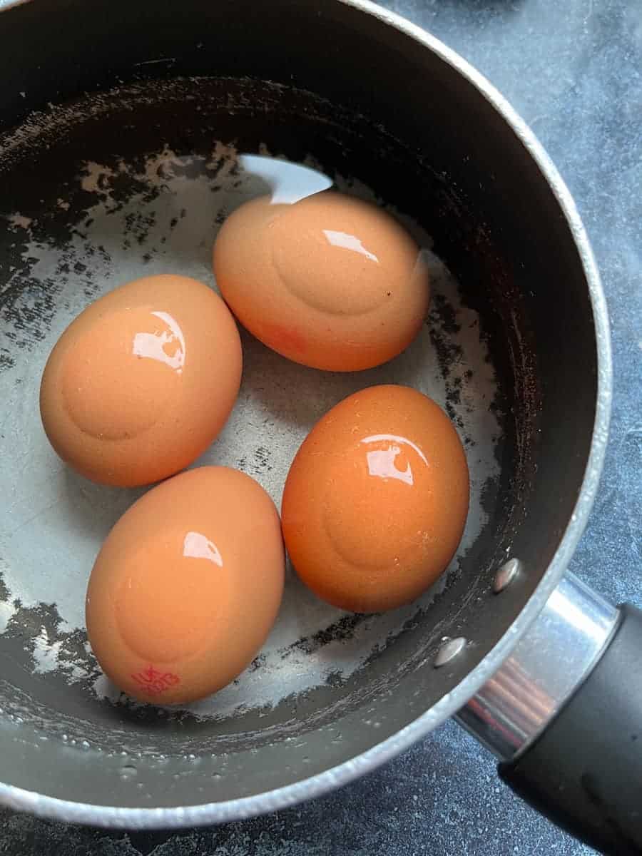 4 eggs in a saucepan of water.